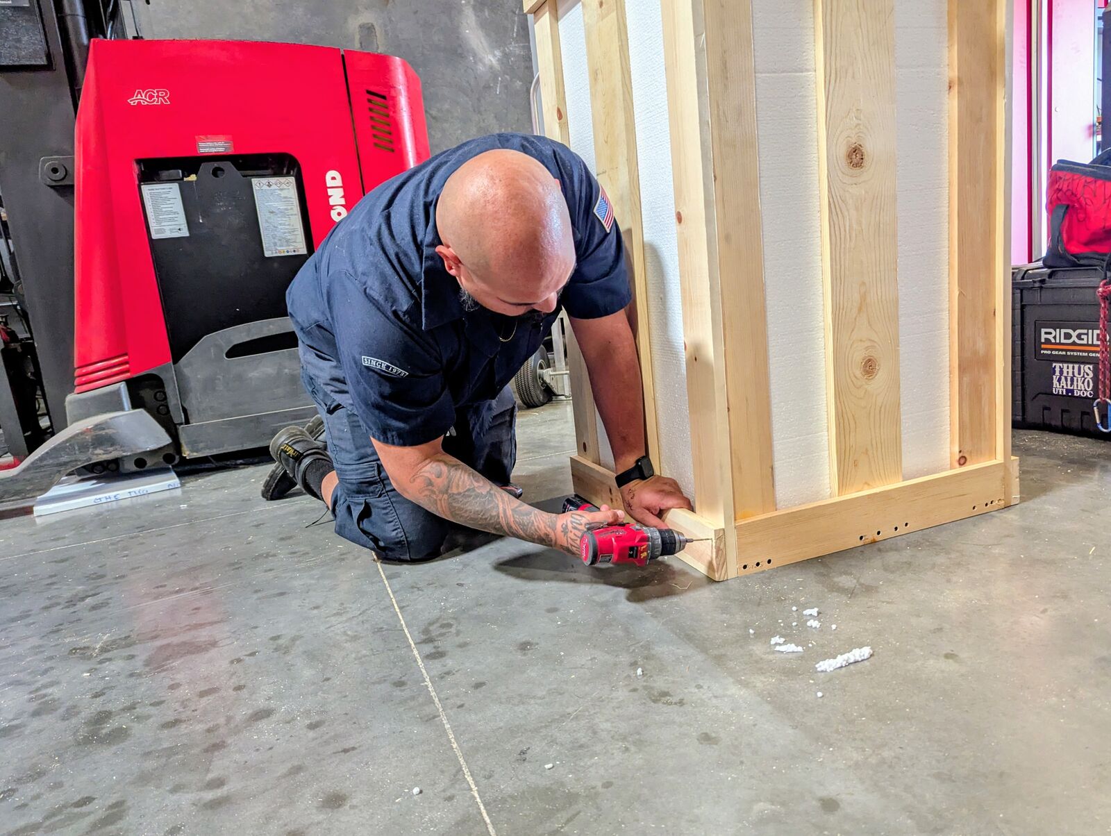Stratton and Sons team member building a custom wooden crate for secure shipping