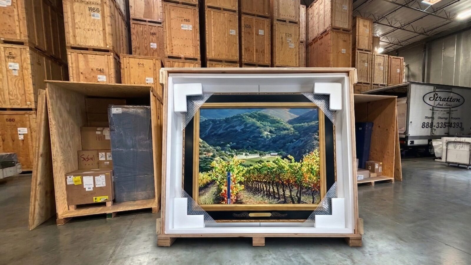 Custom-built wooden crate with handling symbols for secure fine art transport at Stratton and Sons
